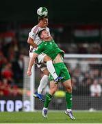 6 September 2025; Willi Orbán of Hungary and Evan Ferguson of Republic of Ireland during the FIFA World Cup 2026 Group F qualifying match between Republic of Ireland and Hungary at the Aviva Stadium in Dublin. Photo by Ben McShane/Sportsfile