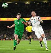 6 September 2025; Evan Ferguson of Republic of Ireland in action against Attila Szalai of Hungary during the FIFA World Cup 2026 Group F qualifying match between Republic of Ireland and Hungary at the Aviva Stadium in Dublin. Photo by Seb Daly/Sportsfile