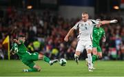 6 September 2025; Attila Szalai of Hungary is tackled by Josh Cullen of Republic of Ireland during the FIFA World Cup 2026 Group F qualifying match between Republic of Ireland and Hungary at the Aviva Stadium in Dublin. Photo by David Fitzgerald/Sportsfile