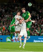 6 September 2025; Nathan Collins of Republic of Ireland in action against Attila Szalai and Milos Kerkez of Hungary during the FIFA World Cup 2026 Group F qualifying match between Republic of Ireland and Hungary at the Aviva Stadium in Dublin. Photo by Stephen McCarthy/Sportsfile
