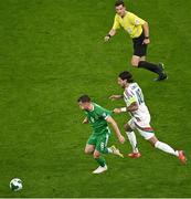 6 September 2025; Jason Knight of Republic of Ireland has his jersey pulled by Dominik Szoboszlai of Hungary, which subsequently led to him being shown a yellow card, during the FIFA World Cup 2026 Group F qualifying match between Republic of Ireland and Hungary at the Aviva Stadium in Dublin. Photo by Piaras Ó Mídheach/Sportsfile