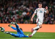 6 September 2025; Roland Sallai of Hungary has a shot saved by Republic of Ireland goalkeeper Caoimhin Kelleher during the FIFA World Cup 2026 Group F qualifying match between Republic of Ireland and Hungary at the Aviva Stadium in Dublin. Photo by Ben McShane/Sportsfile