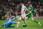 6 September 2025; Republic of Ireland goalkeeper Caoimhin Kelleher makes a save from Roland Sallai of Hungary during the FIFA World Cup 2026 Group F qualifying match between Republic of Ireland and Hungary at the Aviva Stadium in Dublin. Photo by David Fitzgerald/Sportsfile