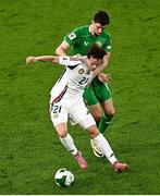6 September 2025; Alex Tóth of Hungary in action against Finn Azaz of Republic of Ireland during the FIFA World Cup 2026 Group F qualifying match between Republic of Ireland and Hungary at the Aviva Stadium in Dublin. Photo by Piaras Ó Mídheach/Sportsfile