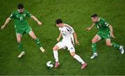 6 September 2025; Alex Tóth of Hungary in action against Republic of Ireland players Finn Azaz, left, and Josh Cullen during the FIFA World Cup 2026 Group F qualifying match between Republic of Ireland and Hungary at the Aviva Stadium in Dublin. Photo by Piaras Ó Mídheach/Sportsfile