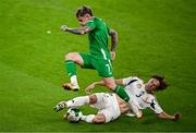 6 September 2025; Sammie Szmodics of Republic of Ireland is tackled by Attila Mocsi of Hungary during the FIFA World Cup 2026 Group F qualifying match between Republic of Ireland and Hungary at the Aviva Stadium in Dublin. Photo by Seb Daly/Sportsfile