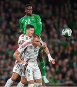 6 September 2025; Chiedozie Ogbene of Republic of Ireland in action against Milos Kerkez and Attila Szalai of Hungary during the FIFA World Cup 2026 Group F qualifying match between Republic of Ireland and Hungary at the Aviva Stadium in Dublin. Photo by David Fitzgerald/Sportsfile