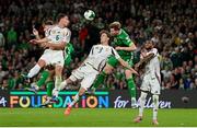 6 September 2025; Nathan Collins of Republic of Ireland in action against Attila Mocsi of Hungary during the FIFA World Cup 2026 Group F qualifying match between Republic of Ireland and Hungary at the Aviva Stadium in Dublin. Photo by Stephen McCarthy/Sportsfile