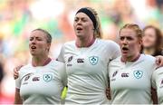7 September 2025; Ireland players, from left, Edel McMahon, Sam Monaghan and Niamh O'Dowd stand for the national anthems before the Women's Rugby World Cup 2025 Pool C match between New Zealand and Ireland at Brighton and Hove Community Stadium in Falmer, England. Photo by Harry Murphy/Sportsfile