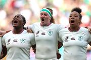 7 September 2025; Ireland players, from left, Linda Djougang, Ruth Campbell and Grace Moore stand for the national anthems before the Women's Rugby World Cup 2025 Pool C match between New Zealand and Ireland at Brighton and Hove Community Stadium in Falmer, England. Photo by Harry Murphy/Sportsfile