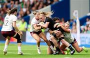 7 September 2025; Jorja Miller of New Zealand is tackled by Ireland players Aoibheann Reilly, Amee Leigh Costigan and Aoife Dalton during the Women's Rugby World Cup 2025 Pool C match between New Zealand and Ireland at Brighton and Hove Community Stadium in Falmer, England. Photo by Harry Murphy/Sportsfile