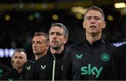 6 September 2025; Republic of Ireland team doctor Sean Carmody and head of athletic performance Damien Doyle, right, stand for the playing of the National Anthem before the FIFA World Cup 2026 Group F qualifying match between Republic of Ireland and Hungary at the Aviva Stadium in Dublin. Photo by Stephen McCarthy/Sportsfile
