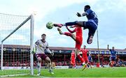 7 September 2025; Jeremy Sivi of Galway United and Sean Gannon of Shelbourne challenge for the ball during the SSE Airtricity Men's Premier Division match between Shelbourne and Galway United at Tolka Park in Dublin. Photo by Seb Daly/Sportsfile