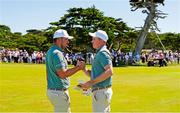 7 September 2025; Eliot Baker and Stuart Grehan of Great Britain and Ireland shake hands on the 17th fairway after losing their match, following Mason Howell of the USA holing his shot from the middle of the fairway during day two of the 50th Walker Cup at Cypress Point Club in California, USA. Photo by Brian Spurlock/Sportsfile