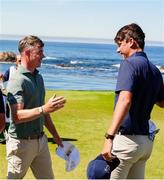 7 September 2025; Mason Howell of USA is congratulated by Stuart Grehan of Great Britain and Ireland after holing his second shot out the 17th fairway for an eagle on a par 4 to win the match against Team Great Britain and Ireland golfers Stuart Grehan and Eliot Baker during day two of the 50th Walker Cup at Cypress Point Club in California, USA. Photo by Brian Spurlock/Sportsfile