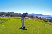 7 September 2025;  Team Great Britain and Ireland golfer Stuart Grehan of Ireland plays his tee shot on the 17th hole during day two of the 50th Walker Cup at Cypress Point Club in California, USA. Photo by Brian Spurlock/Sportsfile