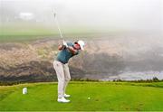 7 September 2025; Gavin Tiernan of Great Britain and Ireland golfer plays his tee shot on the 17th hole during the afternoon singles matches of day two of the 50th Walker Cup at Cypress Point Club in California, USA. Photo by Brian Spurlock/Sportsfile