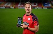 11 September 2025; Harry Wood of Shelbourne with his SSE Airtricity / SWI Player of the Month Award for August 2025 at Tolka Park in Dublin. Photo by Ramsey Cardy/Sportsfile