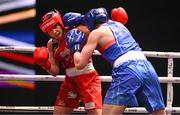 9 September 2025; Lekeisha Pergoliti of Australia, left, in action against Lisa O'Rourke of Ireland during their Women's 70kg quarterfinal bout during the World Boxing Championships 2025 at M&S Bank Arena in Liverpool, England. Photo by Ben McShane/Sportsfile