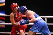 9 September 2025; Lekeisha Pergoliti of Australia, left, in action against Lisa O'Rourke of Ireland during their Women's 70kg quarterfinal bout during the World Boxing Championships 2025 at M&S Bank Arena in Liverpool, England. Photo by Ben McShane/Sportsfile