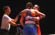 9 September 2025; Lisa O'Rourke of Ireland, left, and Lekeisha Pergoliti of Australia embrace after their Women's 70kg quarterfinal bout during the World Boxing Championships 2025 at M&S Bank Arena in Liverpool, England. Photo by Ben McShane/Sportsfile