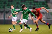 9 September 2025; Jamie Mullins of Republic of Ireland in action against Pere Simonet of Andorra during the UEFA European U21 Championship qualifying match between Republic of Ireland and Andorra at Tallaght Stadium in Dublin. Photo by Ramsey Cardy/Sportsfile
