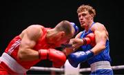 9 September 2025; Danylo Zhasan of Ukraine, left, in action against Brian Kennedy of Ireland during their Men's 85kg Round of 16 bout during the World Boxing Championships 2025 at M&S Bank Arena in Liverpool, England. Photo by Ben McShane/Sportsfile
