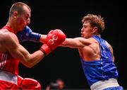 9 September 2025; Danylo Zhasan of Ukraine, left, in action against Brian Kennedy of Ireland during their Men's 85kg Round of 16 bout during the World Boxing Championships 2025 at M&S Bank Arena in Liverpool, England. Photo by Ben McShane/Sportsfile