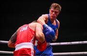 9 September 2025; Danylo Zhasan of Ukraine, left, in action against Brian Kennedy of Ireland during their Men's 85kg Round of 16 bout during the World Boxing Championships 2025 at M&S Bank Arena in Liverpool, England. Photo by Ben McShane/Sportsfile