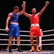 10 September 2025; Erislandy Alvarez Borges of Cuba, right, and Ali Habibnezhad of Iran after their Men's 65kg quarterfinal bout during the World Boxing Championships 2025 at M&S Bank Arena in Liverpool, England. Photo by Ben McShane/Sportsfile