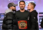 11 September 2025; Lewis Crocker, left, and Paddy Donovan face-off, with promoter Eddie Hearn, centre, during a media conference at The ICC in Belfast ahead of their IBF World Welterweight bout at Clearer Twist National Football Stadium Windsor Park in Belfast on Saturday night. Photo by Ramsey Cardy/Sportsfile