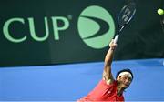 13 September 2025; Yunchaokete Bu of China PR in action during the singles match against Peter Buldorini of Ireland on day one of the Davis Cup World Group II match between Ireland and China PR at the Sport Ireland National Indoor Arena in Dublin. Photo by Piaras Ó Mídheach/Sportsfile