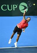 13 September 2025; Yunchaokete Bu of China PR in action during the singles match against Peter Buldorini of Ireland on day one of the Davis Cup World Group II match between Ireland and China PR at the Sport Ireland National Indoor Arena in Dublin. Photo by Piaras Ó Mídheach/Sportsfile