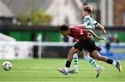 13 September 2025; Mahmoud Hamad of Bohemians in action against Bobby Zeller of Shamrock Rovers during the EA SPORTS MU15 LOI Michael Hayes Cup match between Bohemians and Shamrock Rovers at Carlisle Grounds in Bray, Wicklow. Photo by Shauna Clinton/Sportsfile