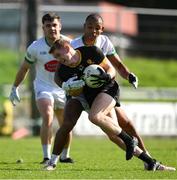 14 September 2025; Cian McMahon of Dr Crokes in action against Stefan Okunbor of Na Gaeil during the Kerry County Senior Club Football Championship final match between Dr Crokes and Na Gaeil at Austin Stack Park in Tralee, Kerry. Photo by Brendan Moran/Sportsfile