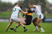 14 September 2025; Brian Looney of Dr Crokes is tackled by Tomas O'Hainifein, left, and Stefan Okunbor of Na Gaeil during the Kerry County Senior Club Football Championship final match between Dr Crokes and Na Gaeil at Austin Stack Park in Tralee, Kerry. Photo by Brendan Moran/Sportsfile