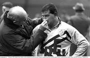 7 February 1993; Ireland's Peter Clohessy receives attention from the team doctor during a training session before the game against France. Lansdowne Road, Dublin. Picture credit: Ray McManus / SPORTSFILE