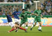 9 October 2004; Andy Reid, Republic of Ireland, in action against Mikael Silvestre, France. FIFA World Cup 2006 Qualifier, France v Republic of Ireland, Stade de France, Paris, France. Picture credit; Brendan Moran / SPORTSFILE