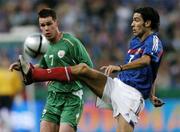 9 October 2004; Steve Finnan, Republic of Ireland, in action against Robert Pires, France. FIFA World Cup 2006 Qualifier, France v Republic of Ireland, Stade de France, Paris, France. Picture credit; David Maher / SPORTSFILE