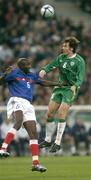 9 October 2004; Kevin Kilbane, Republic of Ireland, in action against Alou Diarra, France. FIFA World Cup 2006 Qualifier, France v Republic of Ireland, Stade de France, Paris, France. Picture credit; Brendan Moran / SPORTSFILE