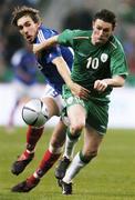 9 October 2004; Robbie Keane, Republic of Ireland, in action against Gael Givet, France. FIFA World Cup 2006 Qualifier, France v Republic of Ireland, Stade de France, Paris, France. Picture credit; David Maher / SPORTSFILE