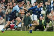 10 October 2004; Mick O'Dowd, Skyrne, in action against Eanna Donoghue, Simonstown Gaels. Meath Senior Football Final, Simonstown Gaels v Skyrne, Pairc Tailteann, Navan, Co. Meath. Picture credit; Pat Murphy / SPORTSFILE