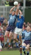 10 October 2004; Alan Meade, Simonstown Gaels, in action against Brian Smith, Skryne. Meath Senior Football Final, Simonstown Gaels v Skryne, Pairc Tailteann, Navan, Co. Meath. Picture credit; Pat Murphy / SPORTSFILE