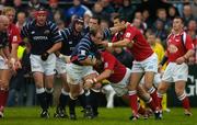 3 October 2004; Frank Sheahan, Munster, in action against Mike Phillips and Iestyn Thomas, Llanelli Scarlets. Celtic League 2004-2005, Munster v Llanelli Scarlets, Thomond Park, Limerick. Picture credit; Brendan Moran / SPORTSFILE
