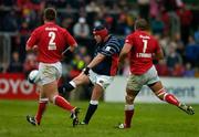 3 October 2004; Anthony Foley, Munster, in action against Matthew Rees (2) and Gavin Thomas (7), Llanelli Scarlets. Celtic League 2004-2005, Munster v Llanelli Scarlets, Thomond Park, Limerick. Picture credit; Brendan Moran / SPORTSFILE
