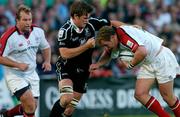 25 September 2004; Campbell Feather, Ulster, is tackled by James Hook, Neath-Swansea Ospreys. Celtic League 2004-2005, Ulster v Neath-Swansea Ospreys, Ravenhill, Belfast. Picture credit; Matt Browne / SPORTSFILE