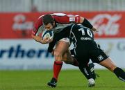 25 September 2004; Kevin Maggs, Ulster, is tackled by Gavin Henson, Neath-Swansea Ospreys. Celtic League 2004-2005, Ulster v Neath-Swansea Ospreys, Ravenhill, Belfast. Picture credit; Matt Browne / SPORTSFILE