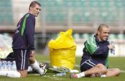 12 October 2004; Republic of Ireland's Roy Keane, left, with team-mate Stephen Carr during squad training. Lansdowne Road, Dublin. Picture credit; David Maher / SPORTSFILE