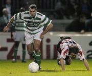8 October 2004; Terry Palmer, Shamrock Rovers, in action against Alan Murphy, Derry City. eircom league, Premier Division, Shamrock Rovers v Derry City, Richmond Park, Dublin. Picture credit; Brian Lawless / SPORTSFILE