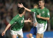 13 October 2004; Robbie Keane, Republic of Ireland, celebrates with team-mate Roy Keane after scoring his sides second goal. With this goal he increases his all time Irish record to 23 international goals. FIFA 2006 World Cup Qualifier, Republic of Ireland v Faroe Islands, Lansdowne Road, Dublin. Picture credit; Brian Lawless / SPORTSFILE